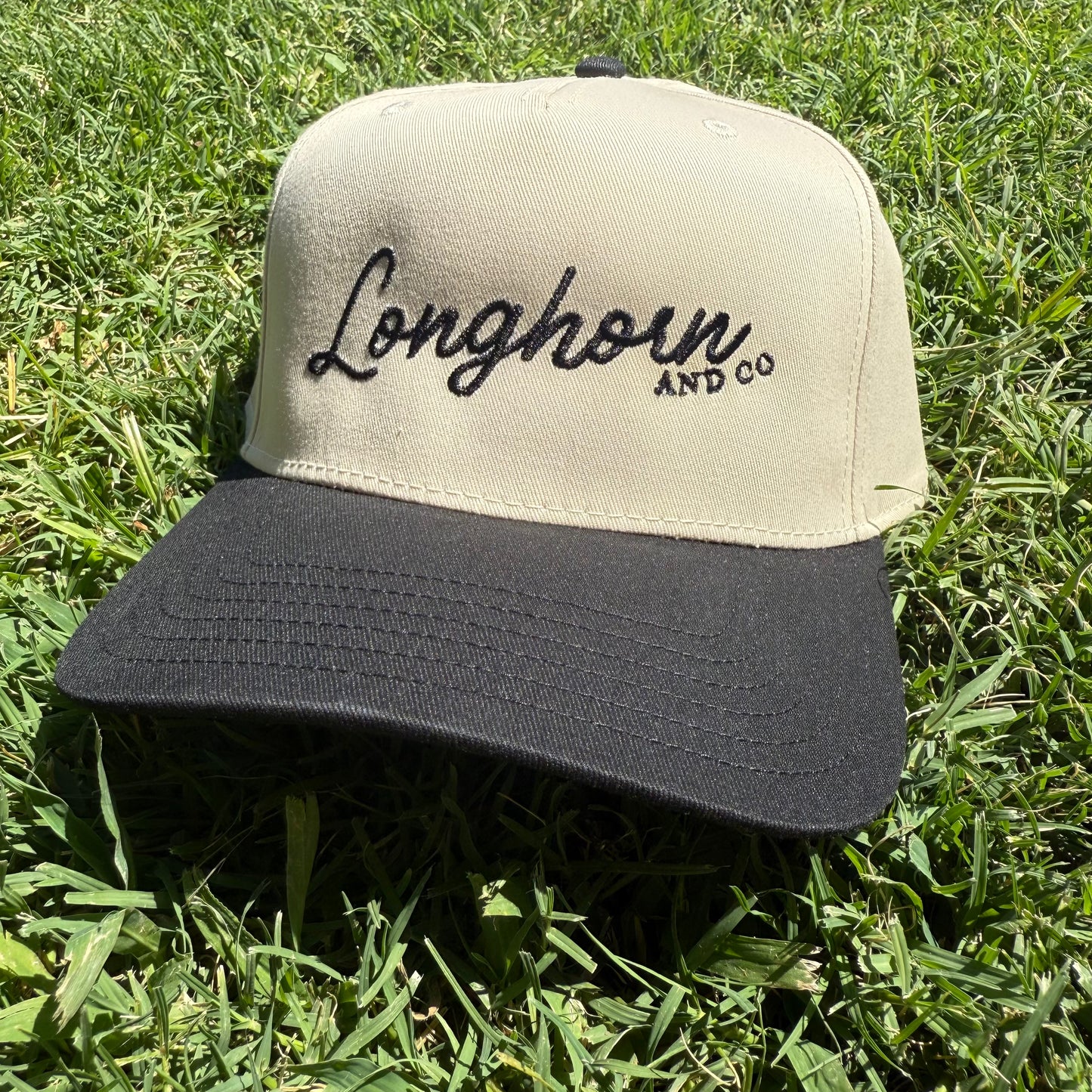 Cream and Black Longhorn and Co. Hat
